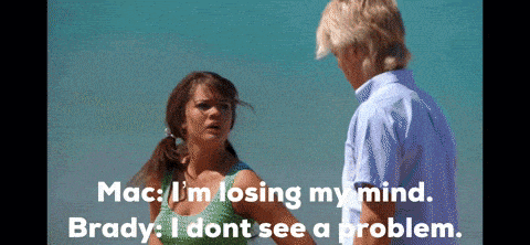 a man and a woman are standing next to each other and the woman is saying mac i 'm losing my mind