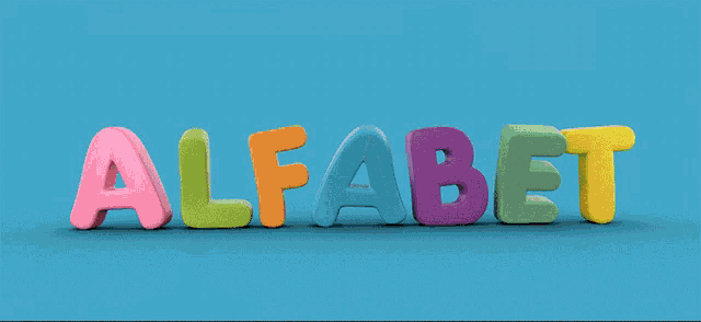 a little girl stands between the letters a and b