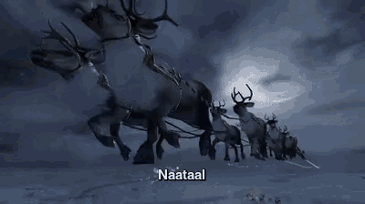 a group of reindeer pulling a sleigh in the snow with the word naataal on the bottom .