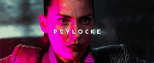 a close up of a woman 's face with the word psylocke written above her