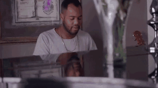 Playing Piano Oops GIF - Playing Piano Oops Smiling GIFs