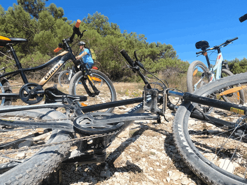 a giant bike is laying on the ground