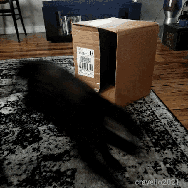 a cardboard box with a sticker on it that says h on it