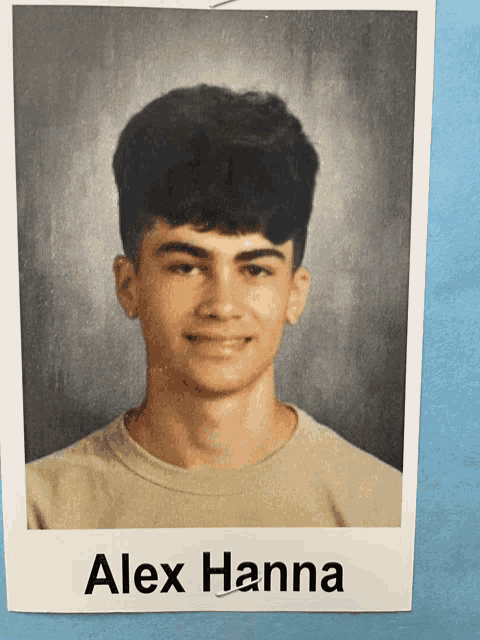 a picture of a young man with the name alex hanna on the bottom