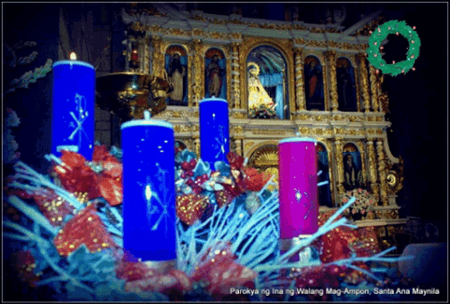 a picture of candles in a church with the words parokya ng isang ng walang mag-ampon santa ana maynila on the bottom