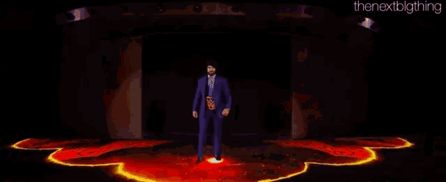 a man in a suit and tie is standing on a stage with the next big thing written on the bottom