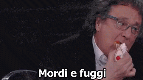 Mordi E Fuggi Mordere Cannolo Enzo Iacchetti GIF - Hit And Run Bite Cannoli GIFs