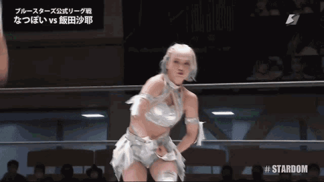a woman in a wrestling ring with #stardom written on the bottom right