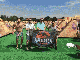 a group of men holding a banner that says america on it