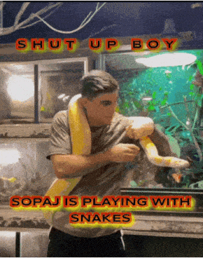 a man holding a snake with the words shut up boy