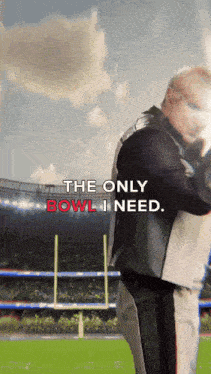 a man stands on a football field with the words " the only bowl i need "