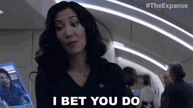 a woman says i bet you do while looking at something