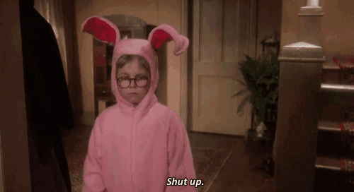 a little boy in a pink bunny costume is saying shut up