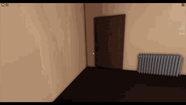 a computer screen shows a room with a door and radiator