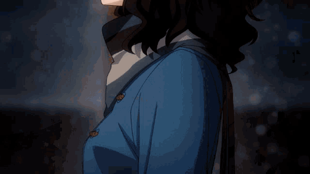 a close up of a person touching another person 's shoulder