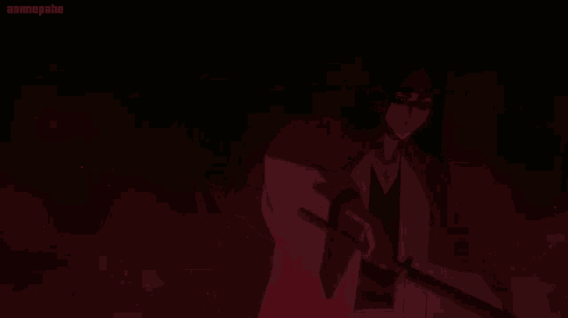 a man in a kimono is holding a sword in the dark and the word animepahe is on the bottom right