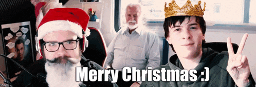 a man wearing a santa hat and a boy wearing a crown wishes merry christmas