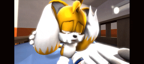 a cartoon fox is laying on a bed and crying
