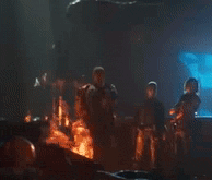 a blurry picture of people standing in front of a blue window