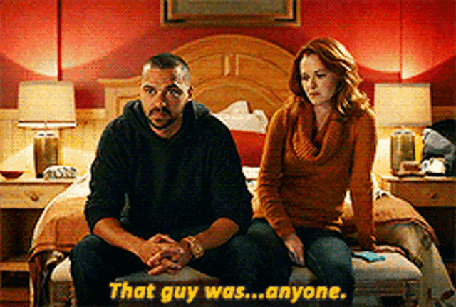 a man and a woman are sitting on a bed and the man says that guy was ... anyone