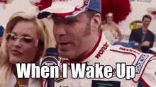 a race car driver is talking into a microphone with the words when i wake up below him