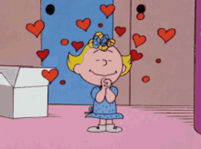 a cartoon of a girl with hearts coming out of her eyes
