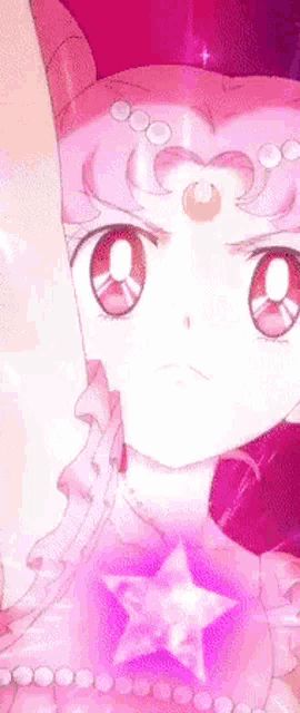 a close up of a girl in a pink dress with a purple star on her chest .