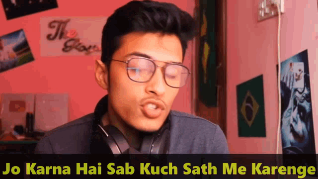a man wearing glasses and headphones with the words " jo karna hai sab kuch sath me karenge " below him