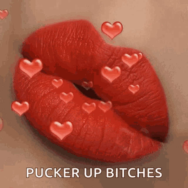 a close up of a woman 's red lips with hearts coming out of them and the words pucker up bitches .