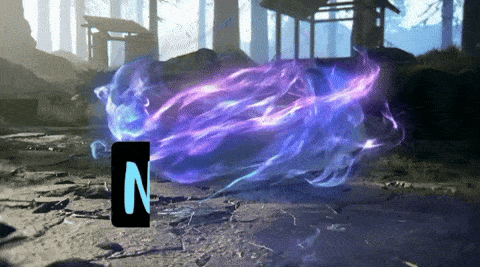 the letter n is on the ground in front of a purple and blue glowing object