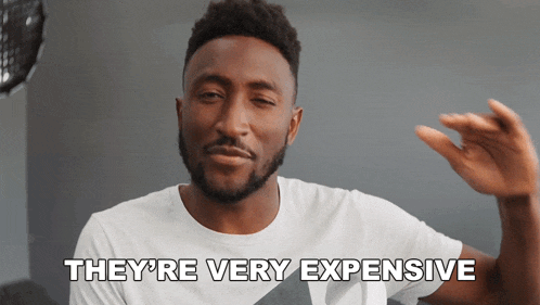 a man says they 're very expensive with his hand