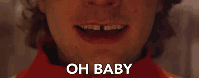 a close up of a man 's mouth with the words oh baby written above it
