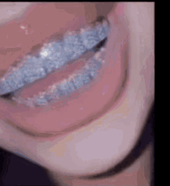a close up of a person 's mouth with braces on it