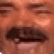 a pixelated close up of a man 's face with a mustache .
