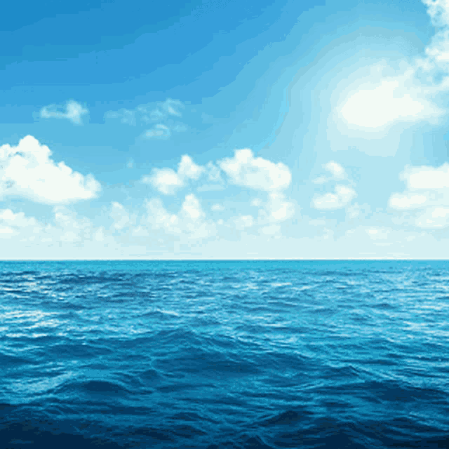 the sun shines brightly over the ocean