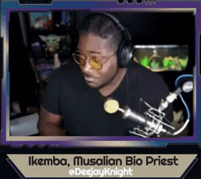 a man wearing headphones stands in front of a microphone with the name ikemba musalian bio priest at the bottom