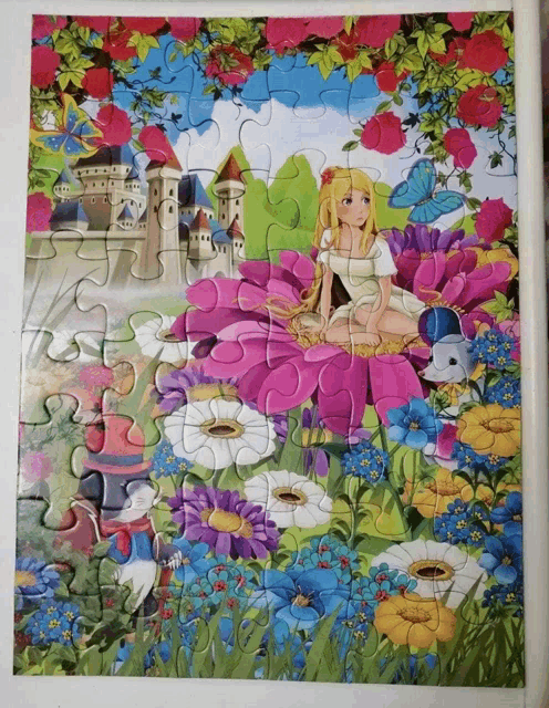 a puzzle with a princess sitting on a flower