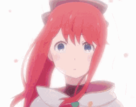 a girl with red hair and blue eyes looks at the camera