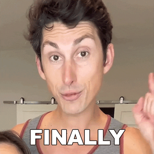 a man in a tank top with the word finally written on his chest