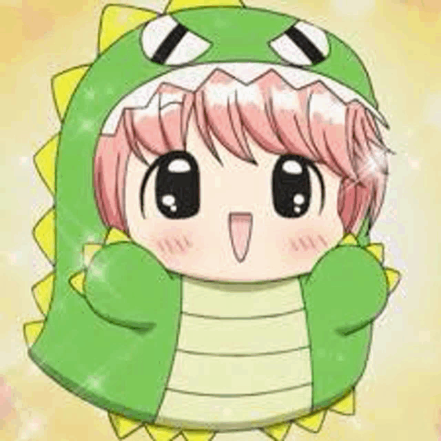 a cartoon girl is wearing a green dinosaur costume .