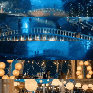 a couple standing on a bridge with a sign that says #loveyou