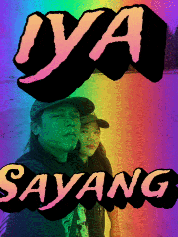 a man and a woman are standing next to each other under a sign that says " ya sayang "