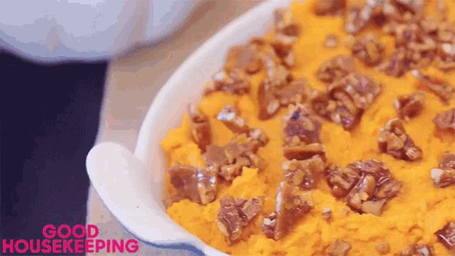 a bowl of food with the words good housekeeping written on the bottom
