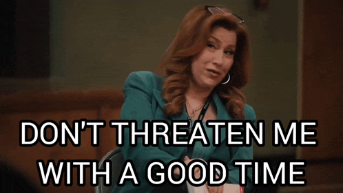 a woman sitting in a chair with the words " do n't threaten me with a good time " on the bottom