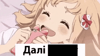 a girl is laying on a bed with a pink phone in her mouth ..