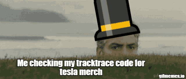 a man wearing a top hat with the words me checking my tracktrace code for tesla merch on it