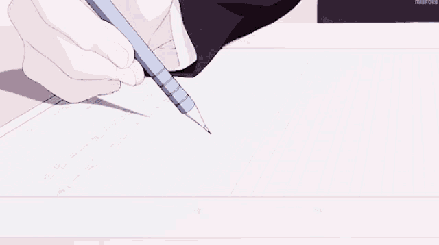 a person writing on a piece of paper with a pen