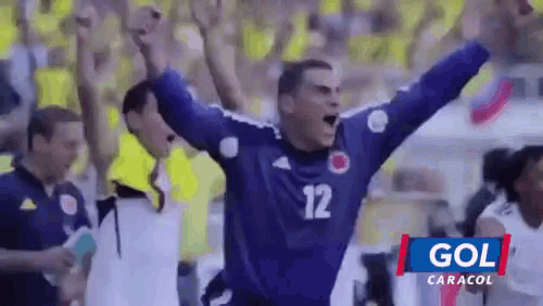 a soccer player with the number 12 on his shirt