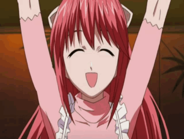 a girl with red hair is smiling with her arms up
