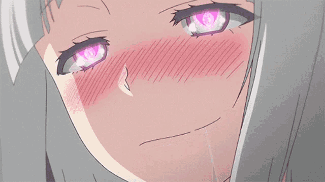 a close up of a girl 's face with a heart shaped eye